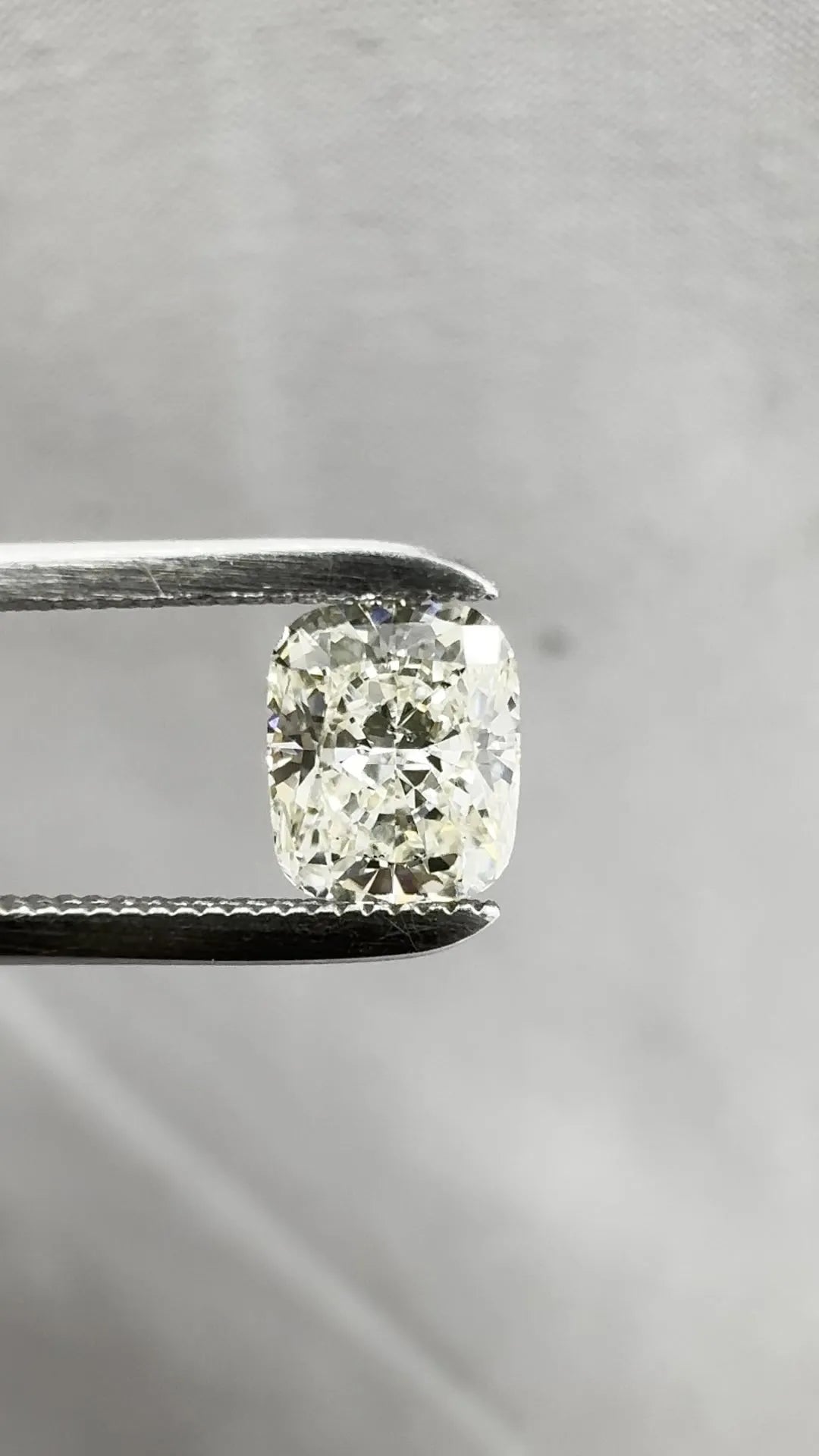 0.76ct Cushion brilliant Natural Diamond (Colour M, Clarity SI2, GIA Certified)